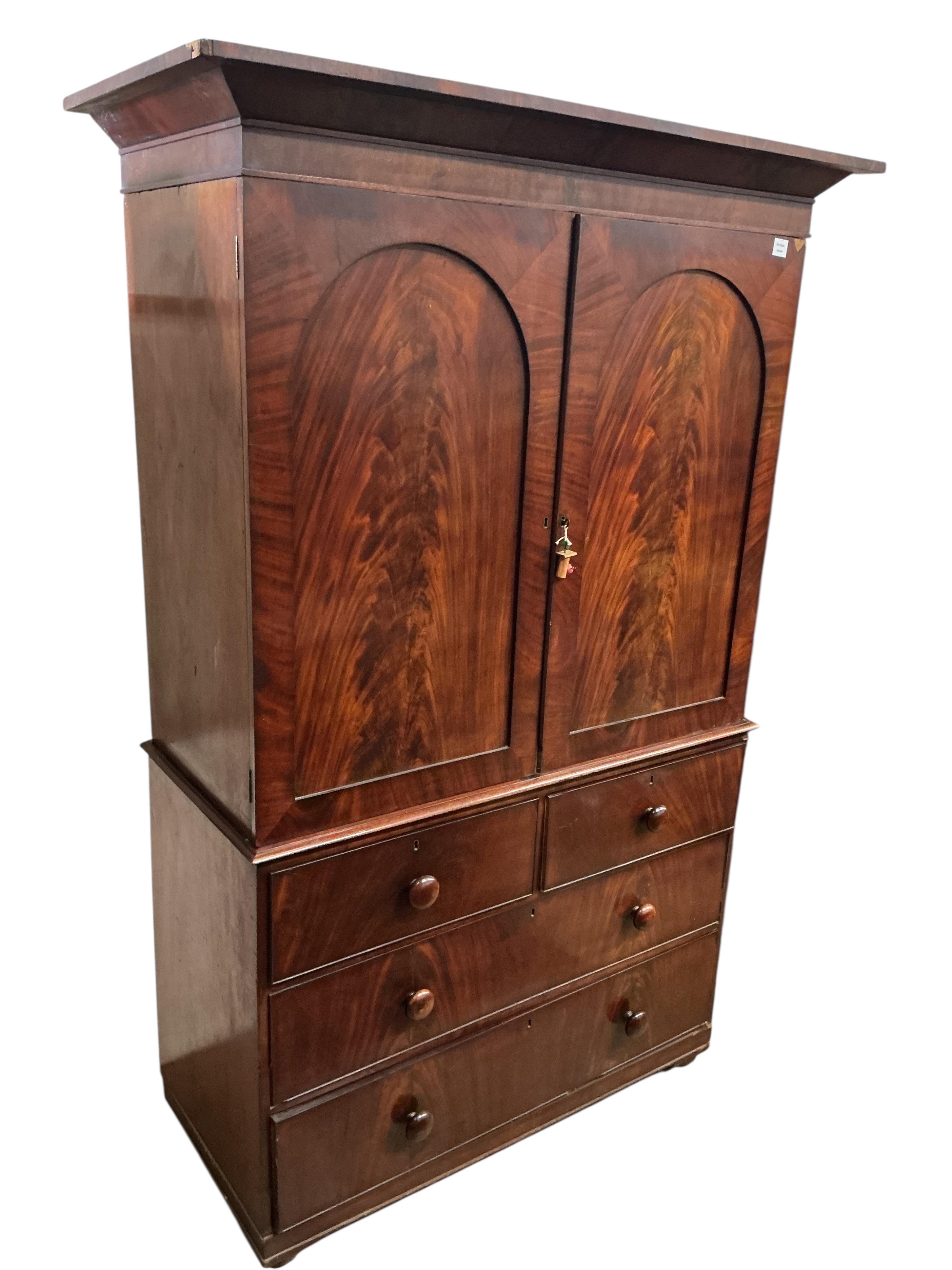 A Victorian mahogany linen press, width 139cm, depth 60cm, height 211cm